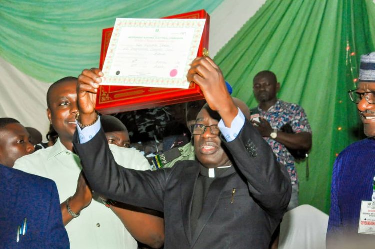 Gov. Hyacinth Alia, displays his Certificate of Return presented to him as the duly elected governor of Benue State during the March 18 governorship election.(Filed photo)