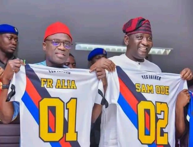 The Executive Governor of Benue State, Rev Fr Hyacinth Alia and his Deputy, Barr Sam Ode who doubles as the Chairman, Lobi Stars Football Club, display jerseys presented to them when officials and players of the club paid the Governor a courtesy call at Government House Makurdi.